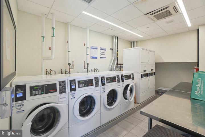 650 Wharf Street Southwest, Unit X48 Washington, DC 20024 - Photo 37 of 42 a utility room with dryer and washer