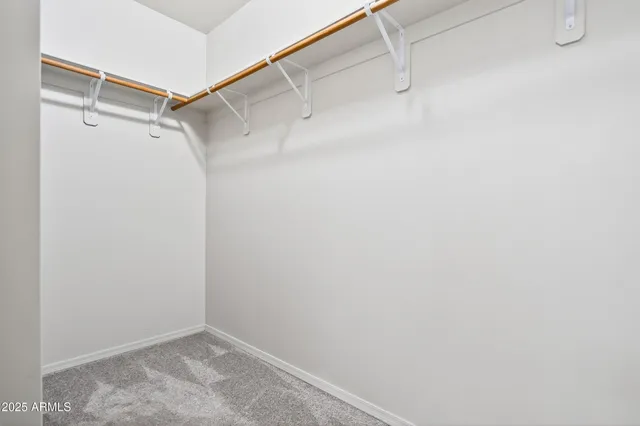 a bathroom with a granite countertop sink mirror and double