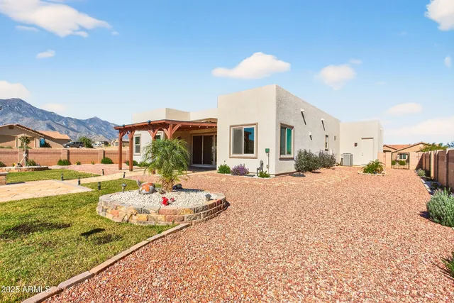 a view of swimming pool with a sitting space