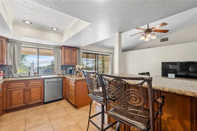 a view of a kitchen and dining room