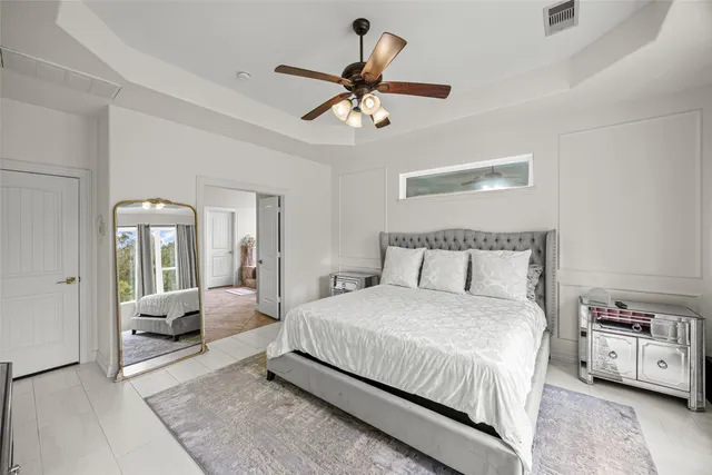 a bathroom with a toilet a sink and a mirror