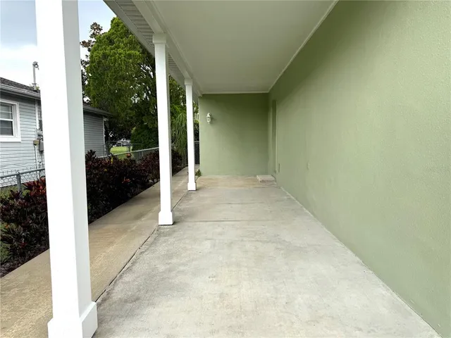 a view of a front door and porch