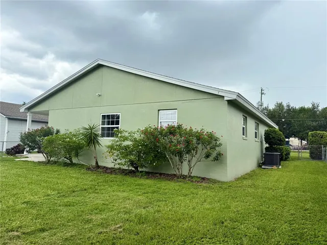 a view of a garden with a fountain