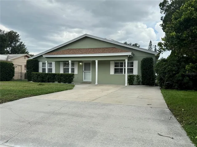 a kitchen with sink a cabinets and window
