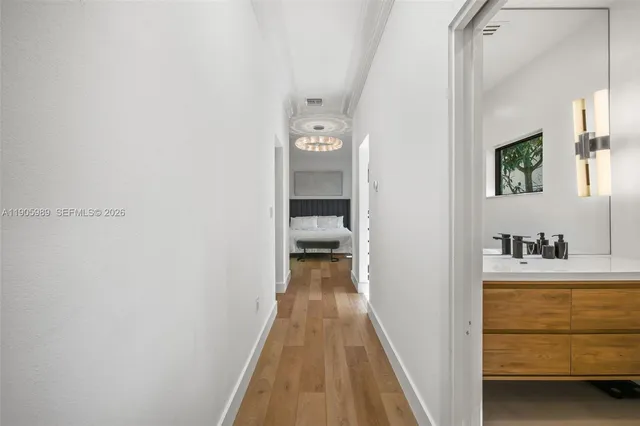 a view of a bedroom from a hallway