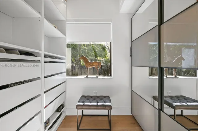 a room with furniture and a window