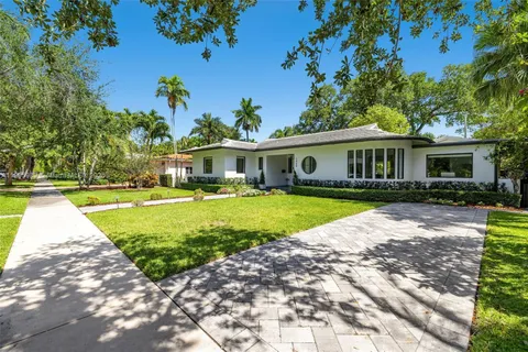 a view of a house with a swimming pool
