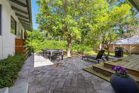 a view of a patio in backyard