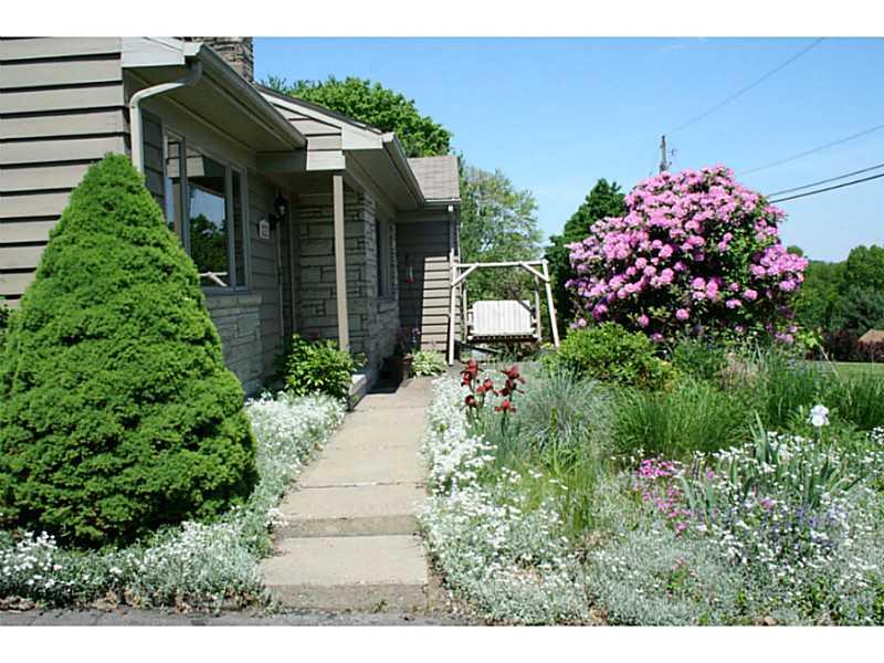 204 Mingo Road Wexford, PA 15090 - Photo 2 of 25 Exterior Front. BEAUTIFUL PERRENIAL FLOWERS GREET YOU AND YOUR GUESTS,