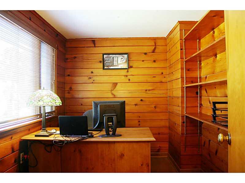 204 Mingo Road Wexford, PA 15090 - Photo 12 of 25 Den. PLENTY OF SPACE WITH BUILT-IN SHELVING IN THE DEN WITH A LOVELY VIEW OF THE FRONT YARD.