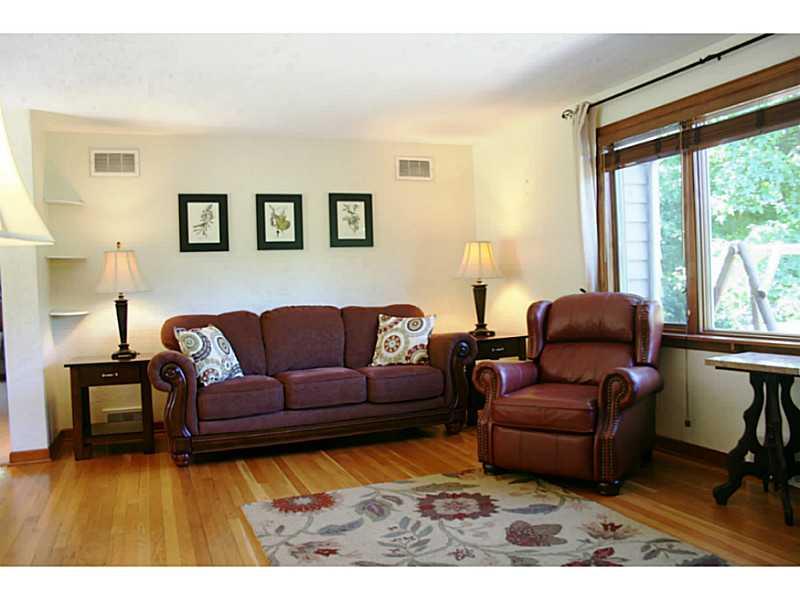 204 Mingo Road Wexford, PA 15090 - Photo 6 of 25 Living Room. HARDWOOD FLOORS AND EXPANSIVE WINDOW WITH CUSTOM BLINDS.