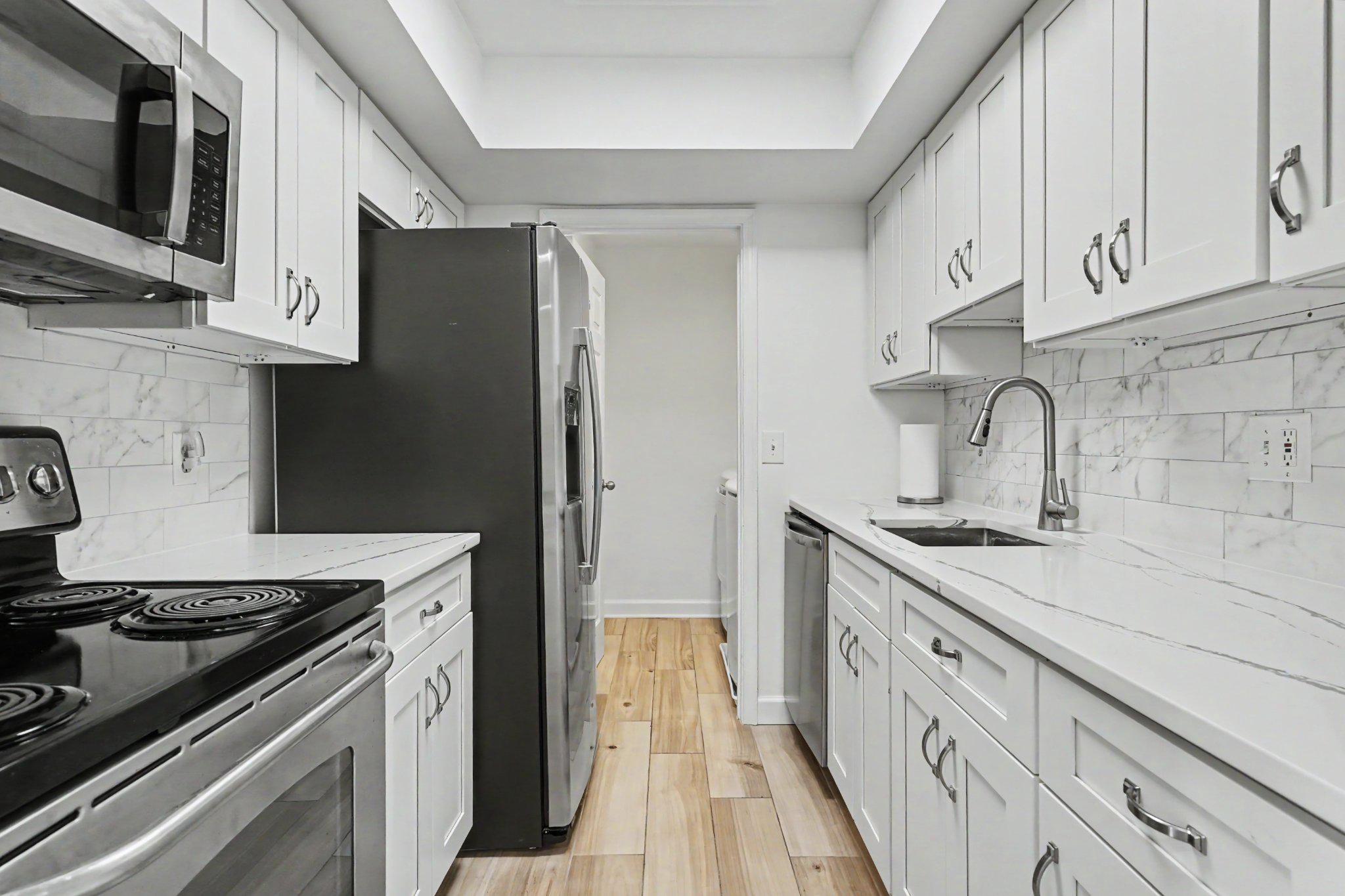 14800 Rydell Road, Unit 201 Centreville, VA 20121 - Photo 10 of 28 Kitchen with high end fixtures.