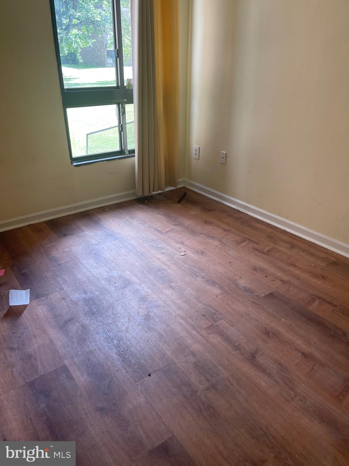 7985 Riggs Road, Unit 1 Hyattsville, MD 20783 - Photo 11 of 25 an empty room with windows