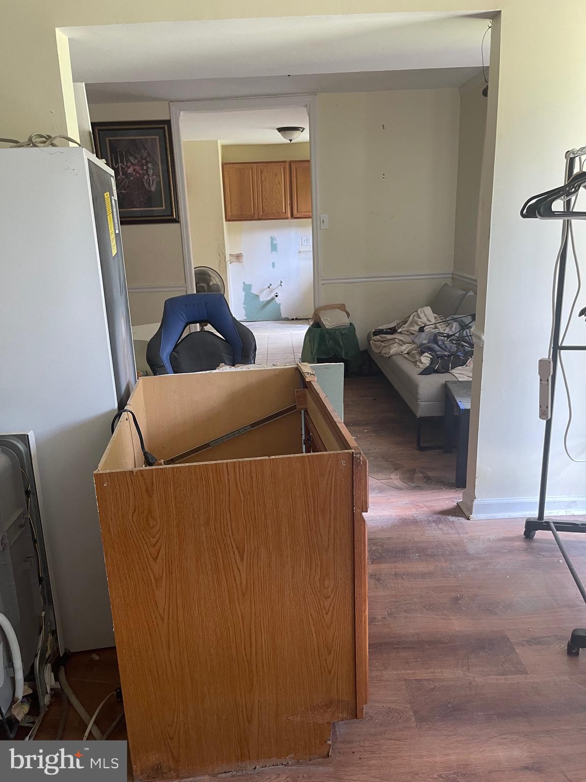 7985 Riggs Road, Unit 1 Hyattsville, MD 20783 - Photo 16 of 25 a living room with furniture and a table