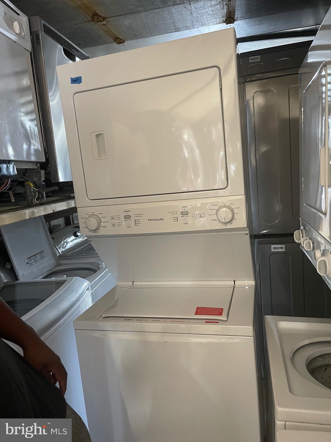7985 Riggs Road, Unit 1 Hyattsville, MD 20783 - Photo 24 of 25 a close up view of washer and dryer