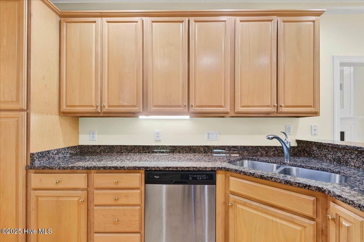 8985 Woodbine Road Southwest Sunset Beach, NC 28468 - Photo 23 of 65 Kitchen with spacious countertops, dishwasher, and ample cabinet space