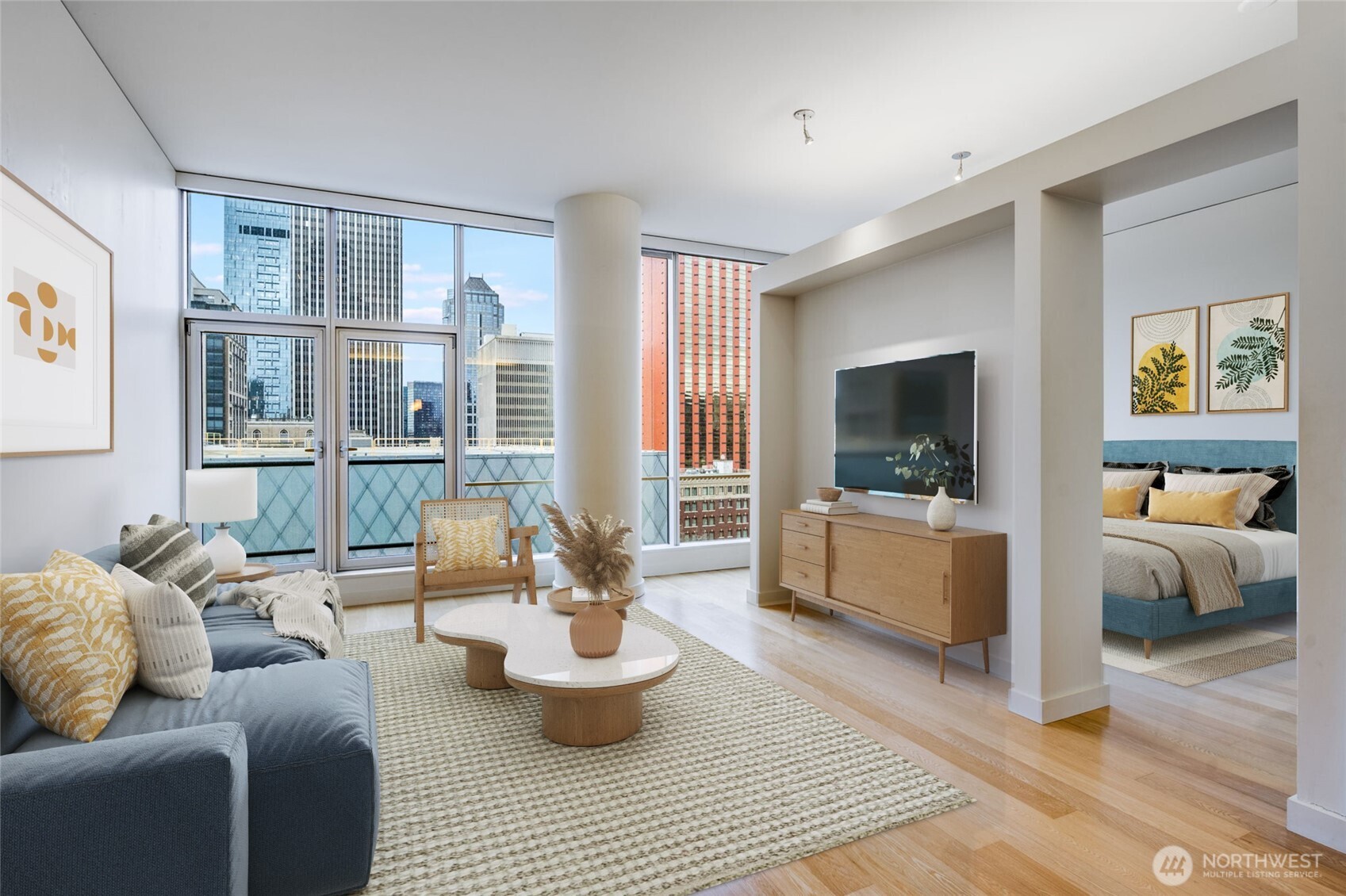 909 5th Avenue, Unit 1203 Seattle, WA 98164 - Photo 1 of 32 a living room with furniture and a window