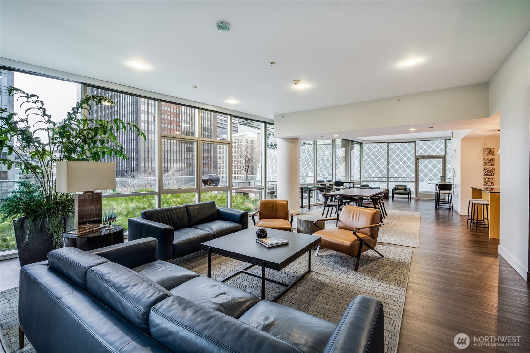 909 5th Avenue, Unit 1203 Seattle, WA 98164 - Photo 30 of 32 a living room with furniture and a large window
