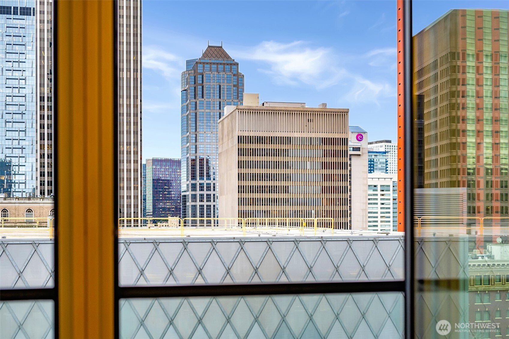 909 5th Avenue, Unit 1203 Seattle, WA 98164 - Photo 5 of 32 a view of a building from a window