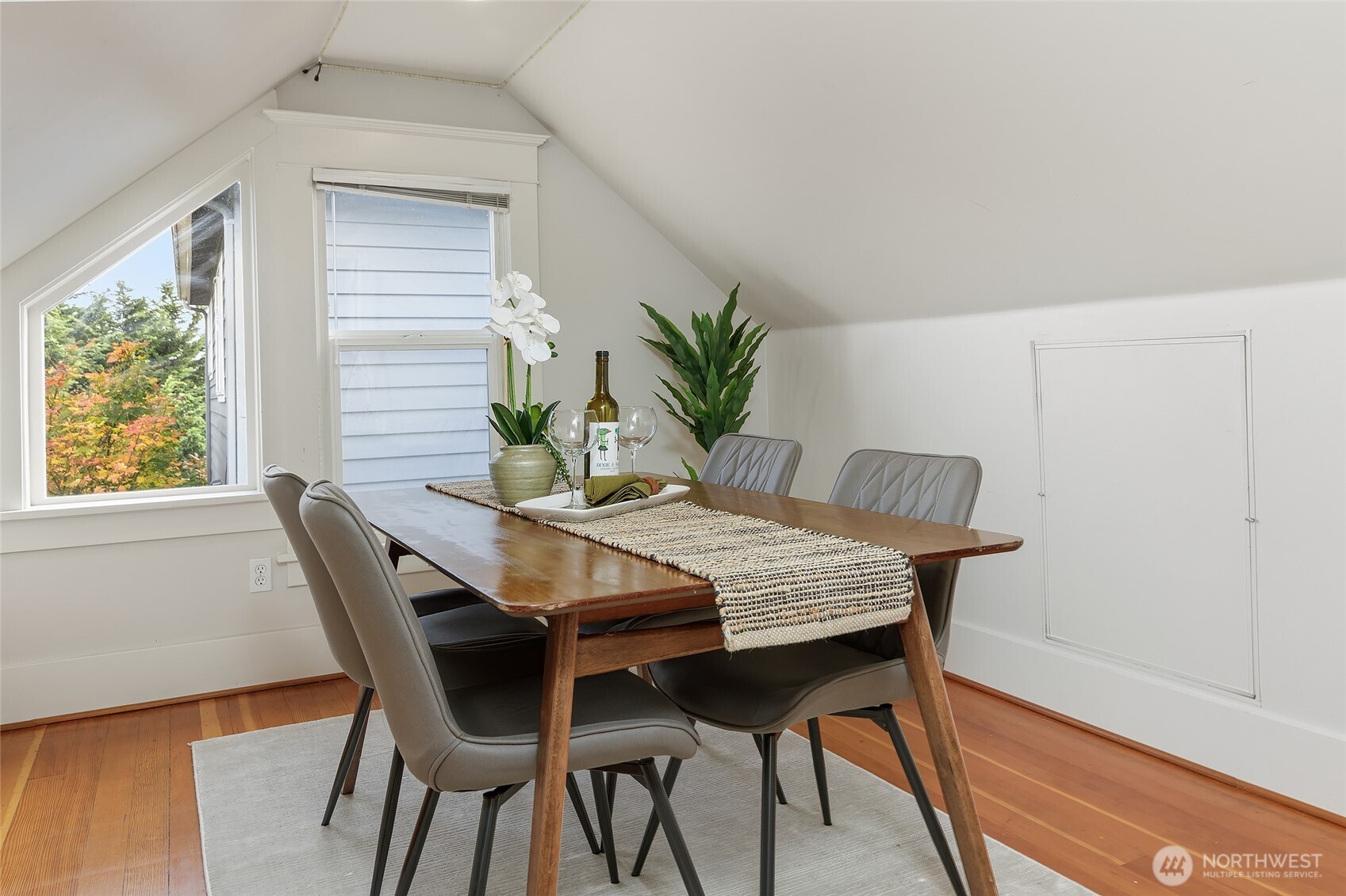 3624 Whitman Avenue North, Unit 4 Seattle, WA 98103 - Photo 17 of 39 a dining room with furniture and window