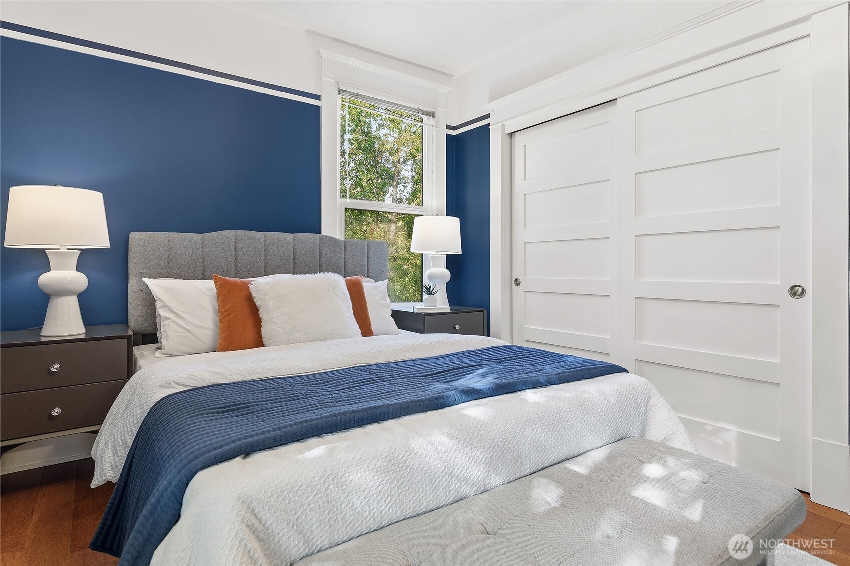 3624 Whitman Avenue North, Unit 4 Seattle, WA 98103 - Photo 22 of 39 a bedroom with a bed and a window