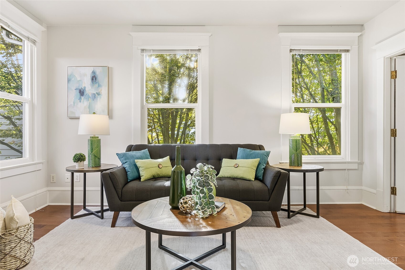 3624 Whitman Avenue North, Unit 4 Seattle, WA 98103 - Photo 9 of 39 a living room with furniture and a window