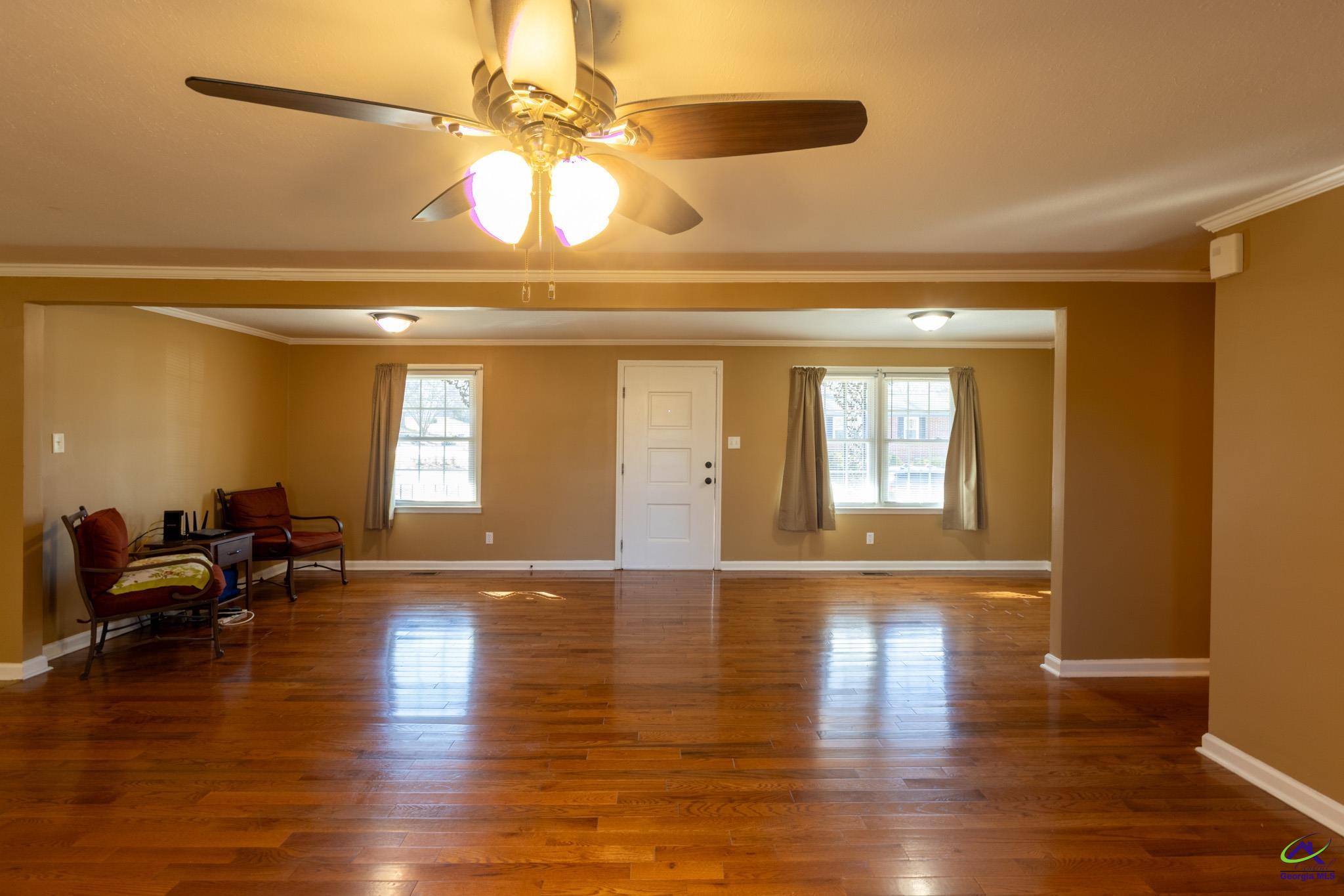 3491 Sandy Circle Macon, GA 31216 - Photo 4 of 47 a view of empty room with wooden floor