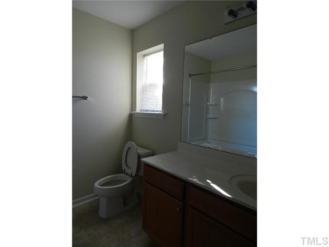 8020 River Watch Lane Raleigh, NC 27616 - Photo 9 of 10 a bathroom with a sink and a toilet