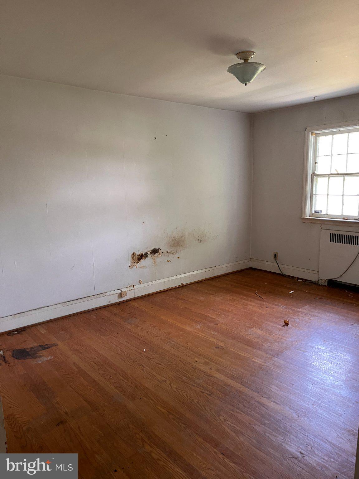 5906 Ayleshire Road Baltimore, MD 21239 - Photo 24 of 41 Second Bedroom with hardwood floors