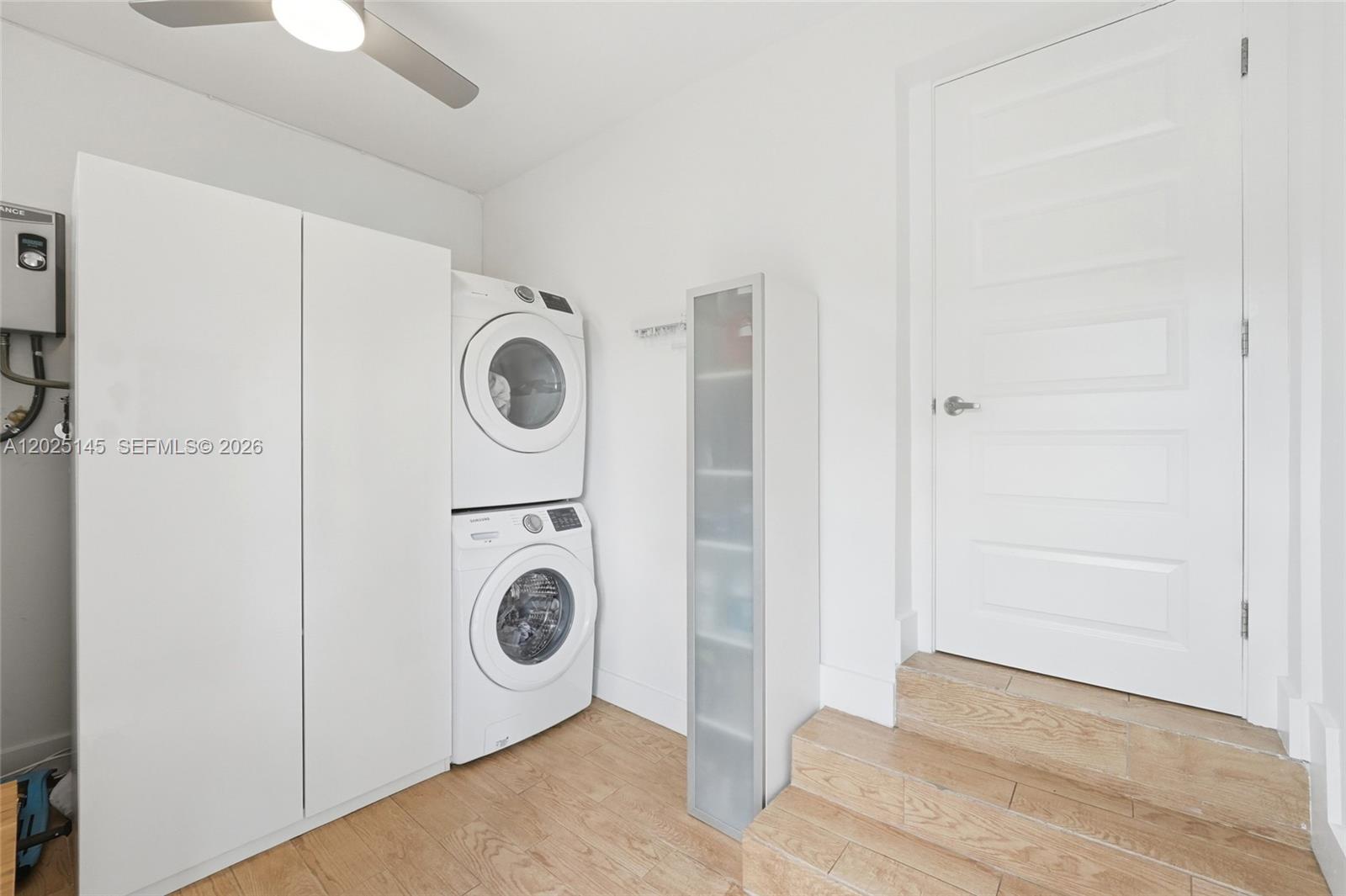 3101 Southwest 25th Terrace Miami, FL 33133 - Photo 22 of 31 a utility room with dryer and washer