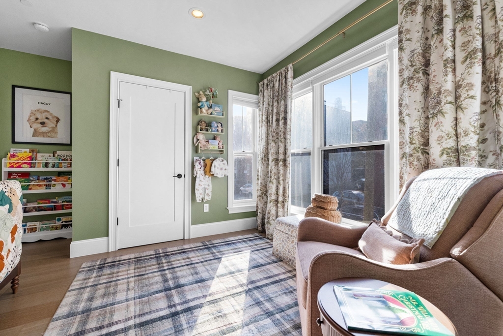 258-260 West 3rd Street, Unit 1 Boston, MA 02127 - Photo 25 of 37 a living room with furniture and a window