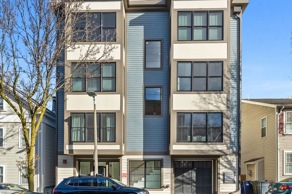 258-260 West 3rd Street, Unit 1 Boston, MA 02127 - Photo 35 of 37 a front view of a multi story building