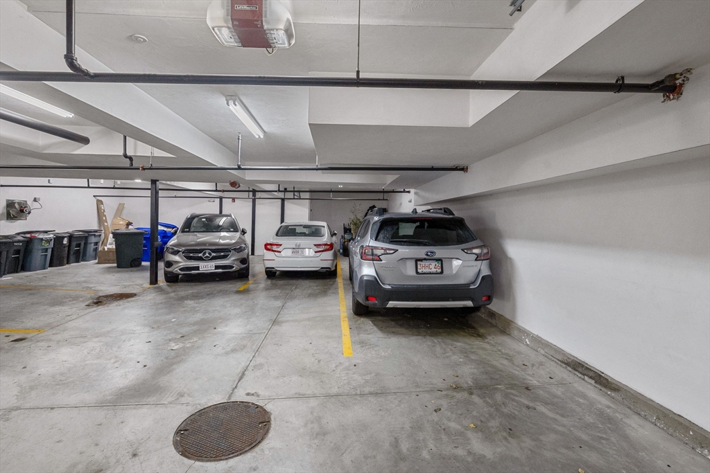 258-260 West 3rd Street, Unit 1 Boston, MA 02127 - Photo 36 of 37 a view of parking garage with cars