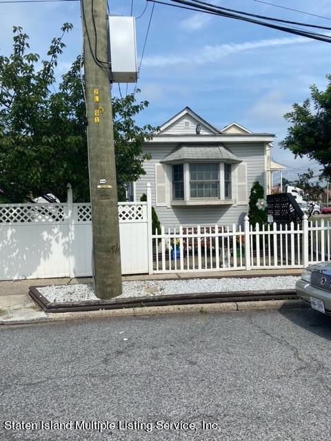 a front view of a house with a porch
