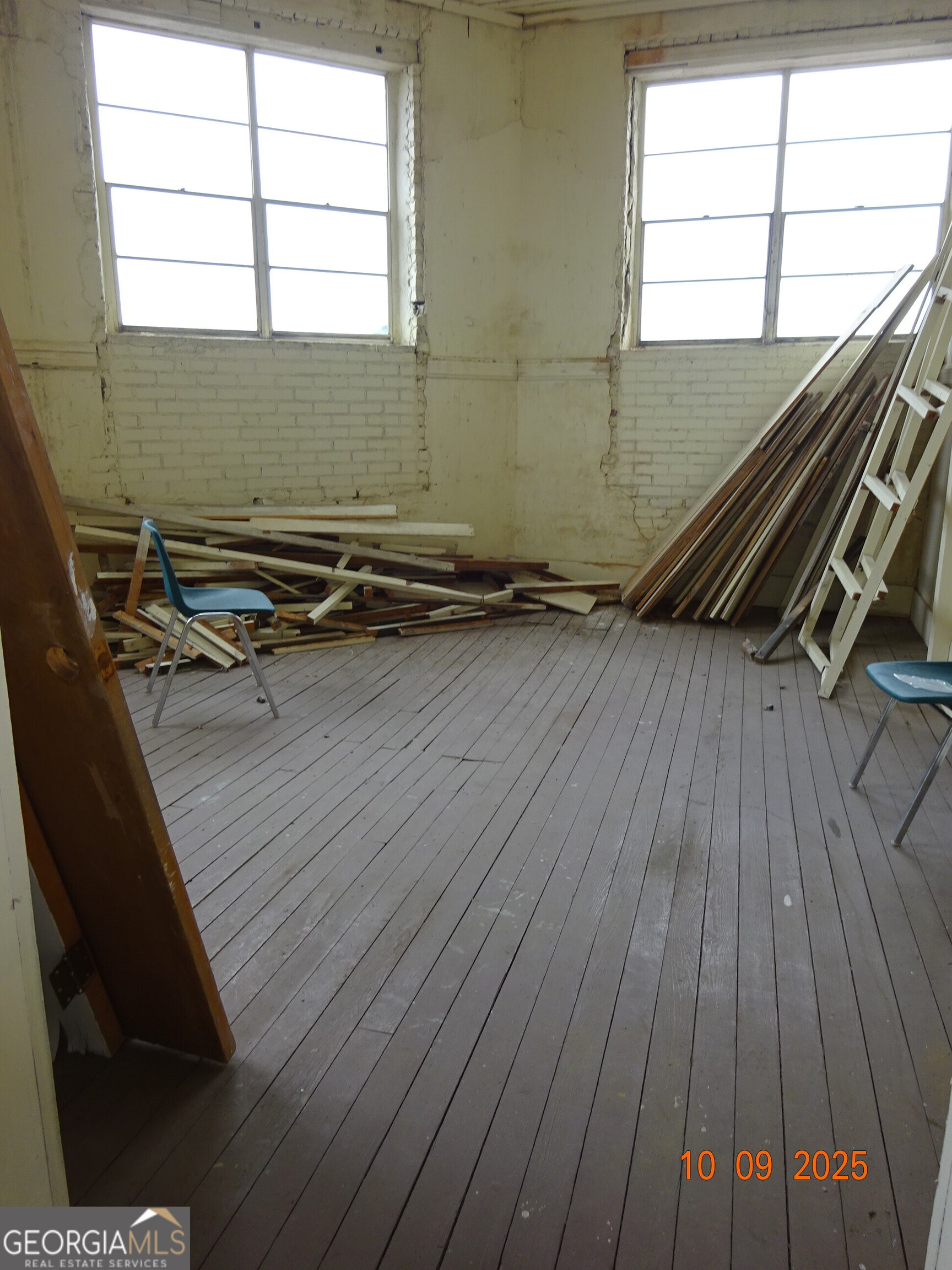 1 East Railroad Street Claxton, GA 30417 - Photo 18 of 21 a view of a room with wooden floor