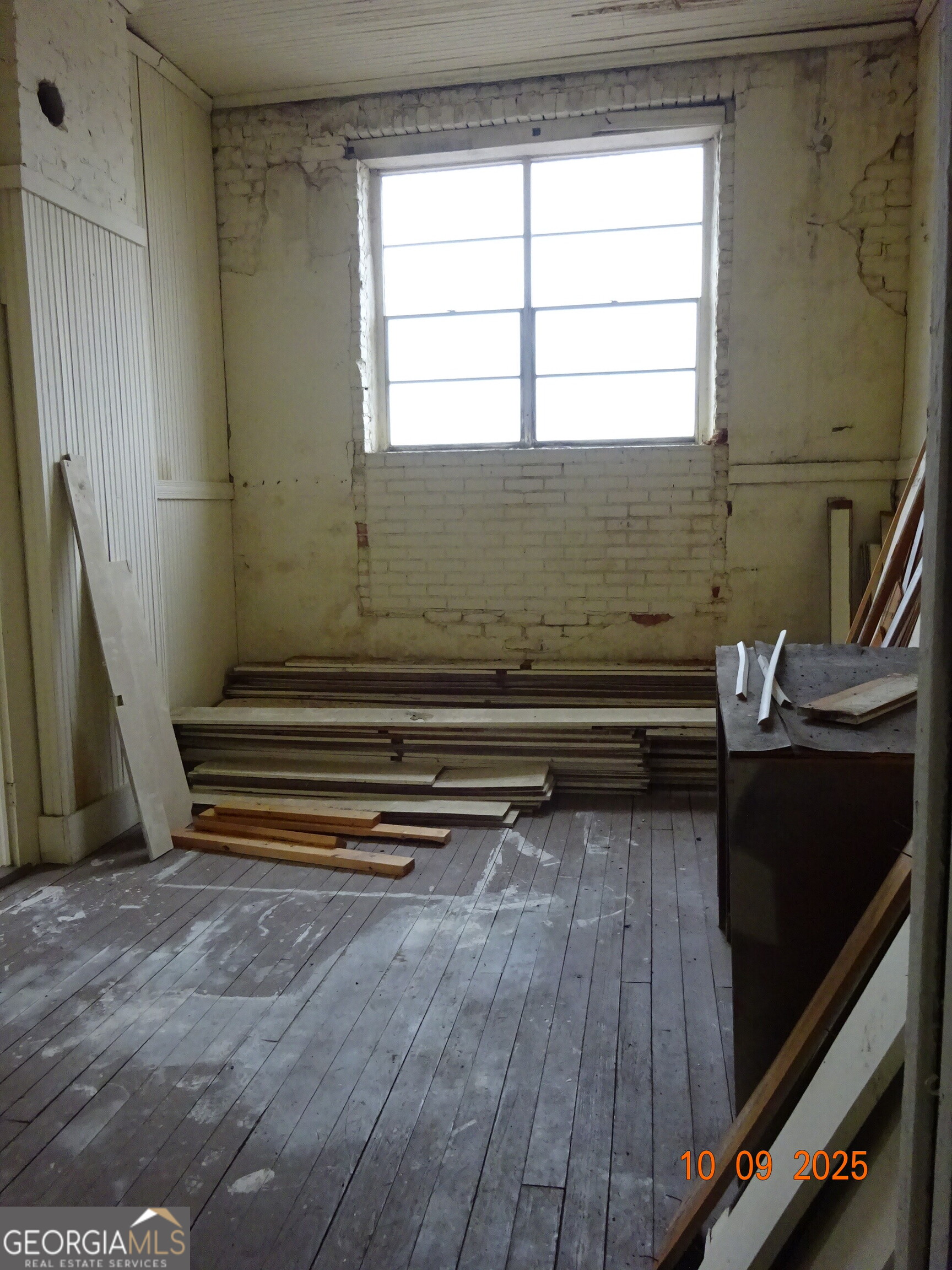 1 East Railroad Street Claxton, GA 30417 - Photo 20 of 21 a view of a room with wooden floor and stairs