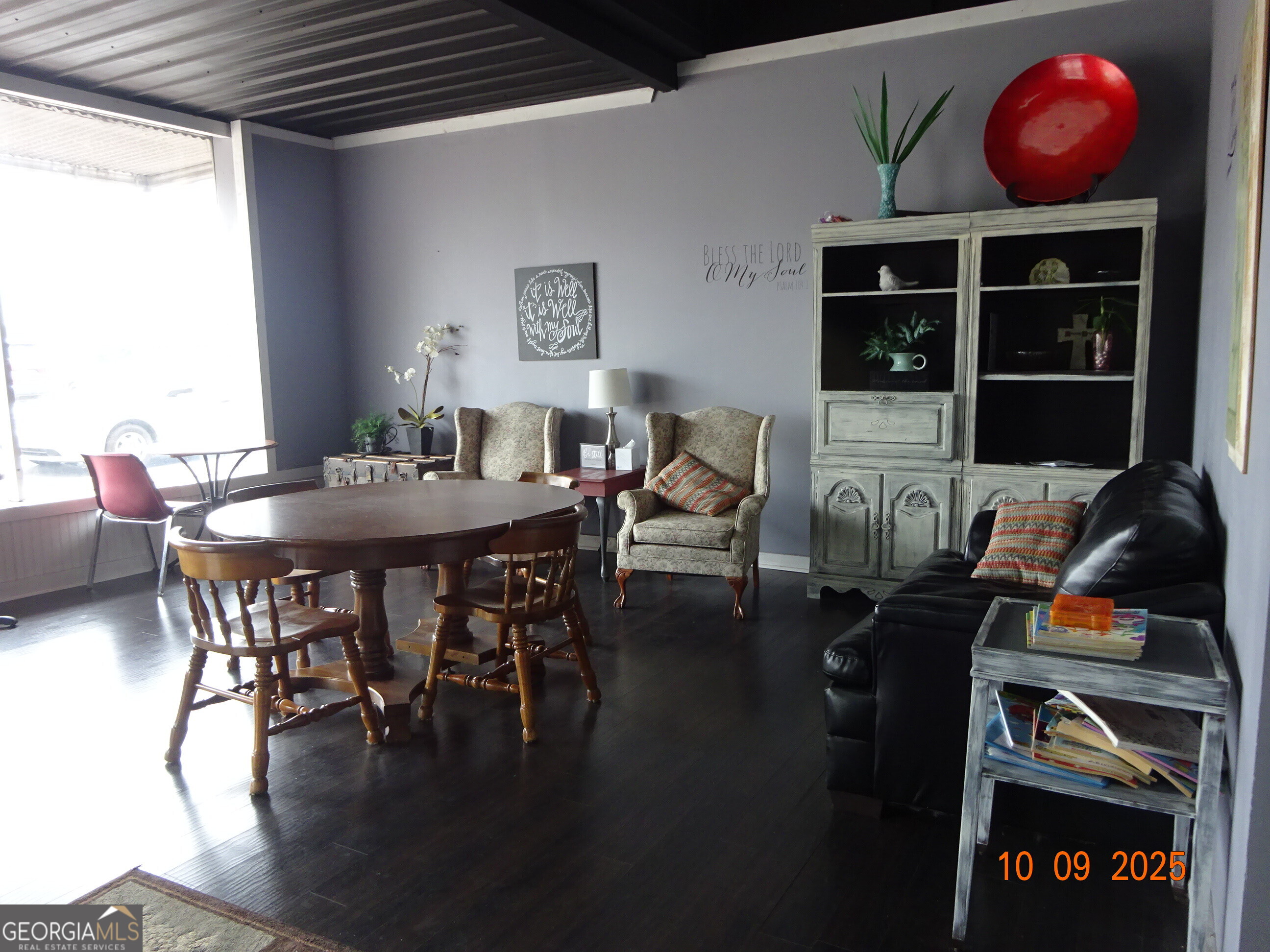 1 East Railroad Street Claxton, GA 30417 - Photo 5 of 21 a view of a dining room with furniture and wooden floor