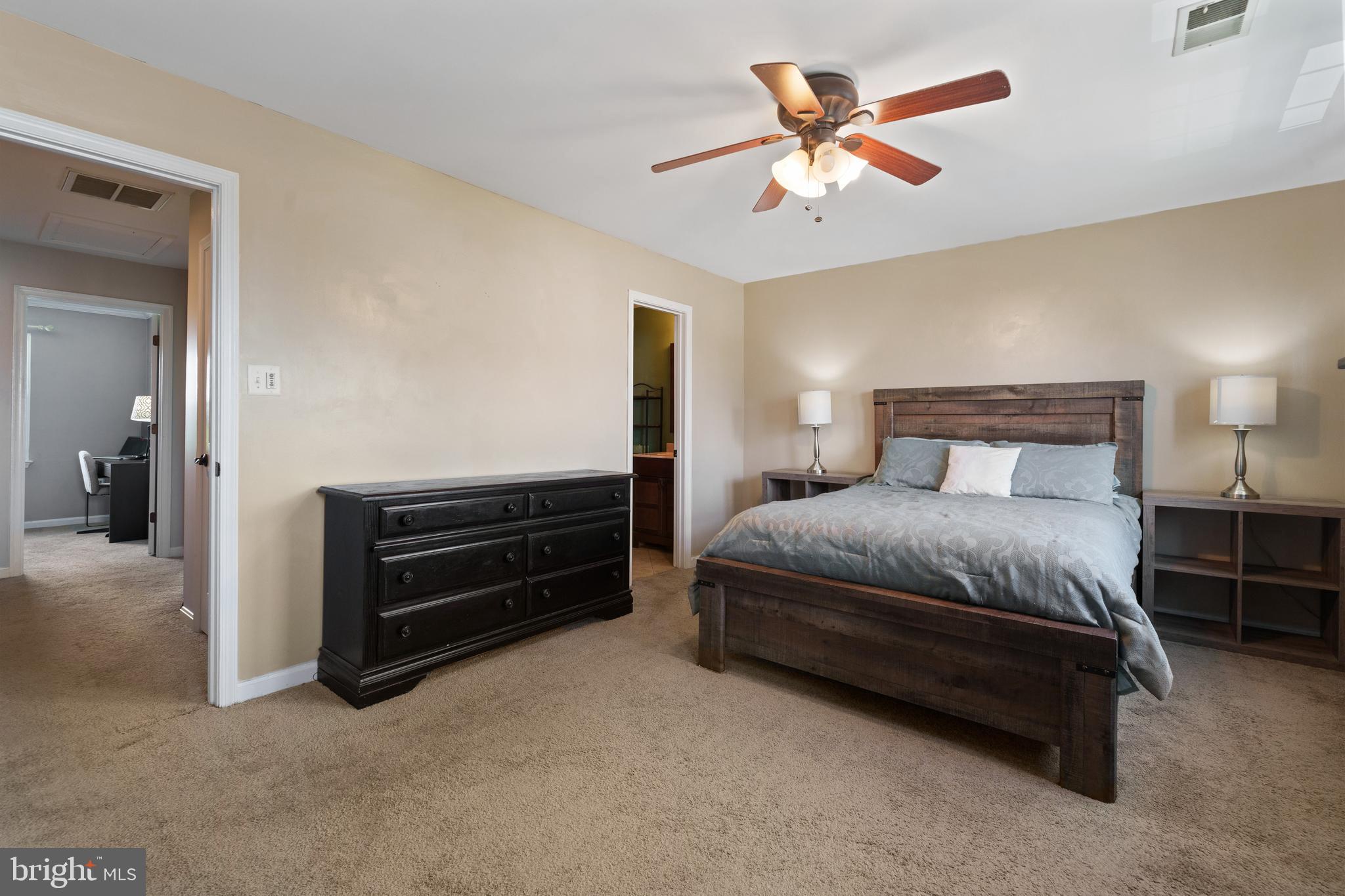 11279 Kessler Place Manassas, VA 20109 - Photo 22 of 39 a bedroom with a bed and a ceiling fan