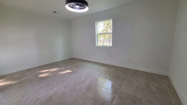 an empty room with a window