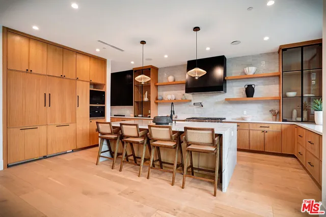a work room with furniture and a window