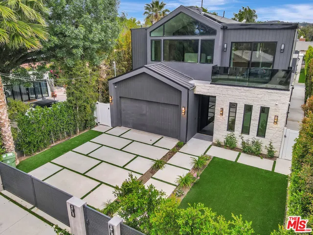 a view of a dining room with furniture and window