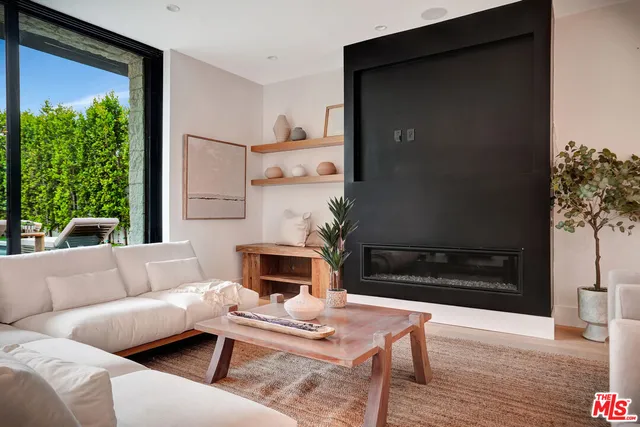 a kitchen with a table and chairs in it