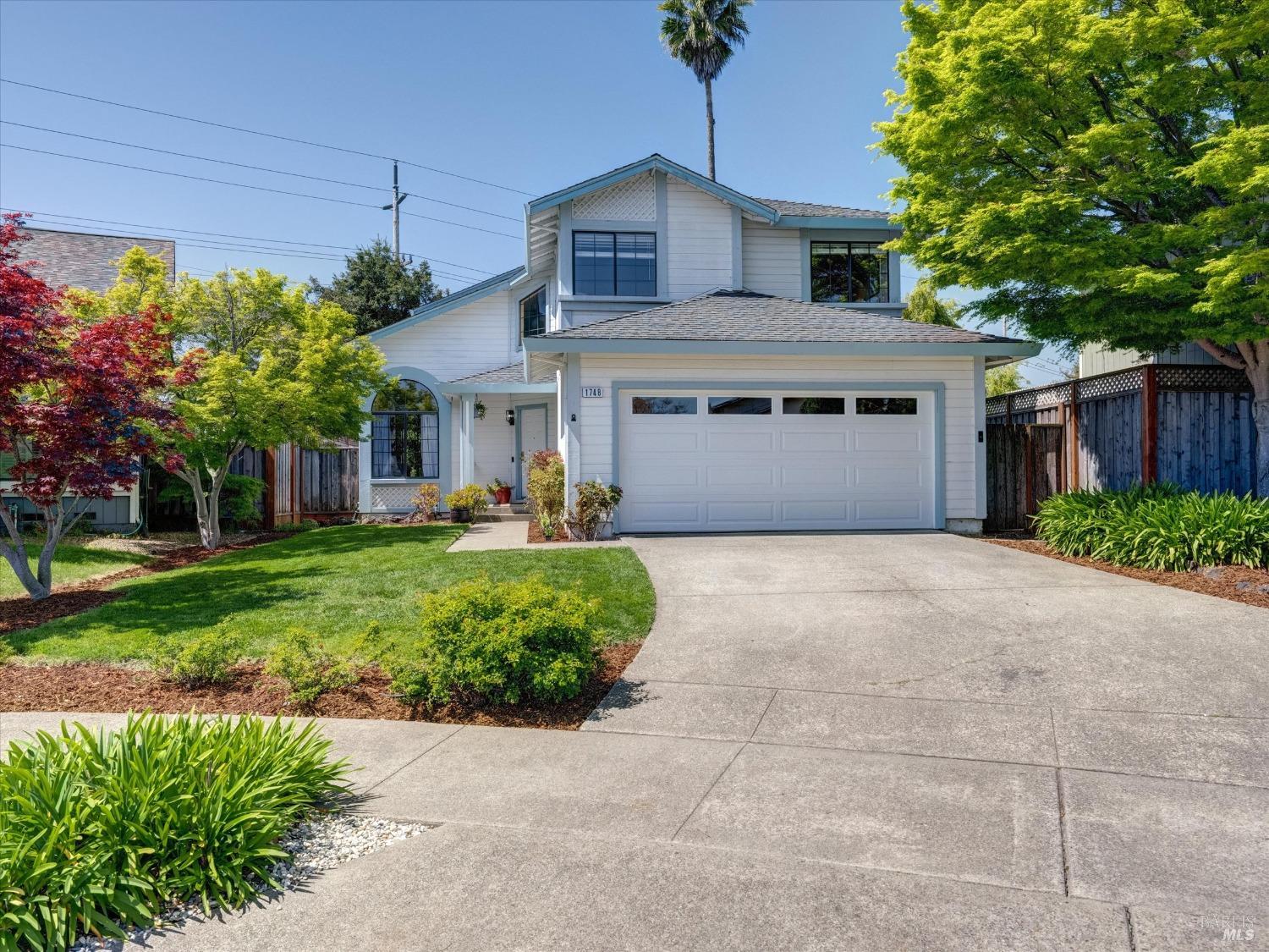 1748 Randon Way Santa Rosa, CA 95403 - Photo 1 of 1 a front view of a house with a garden