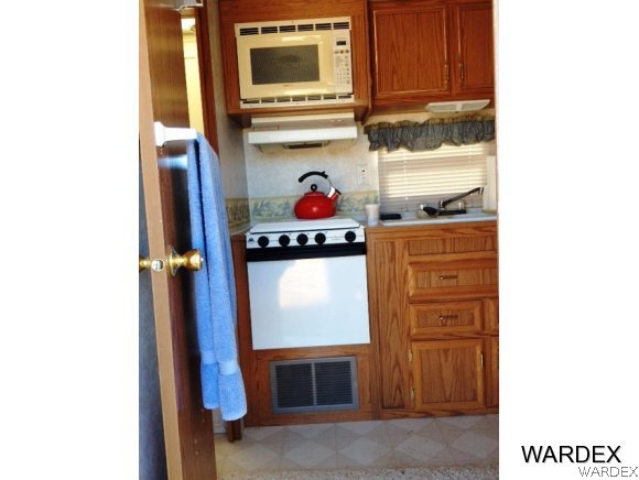220 South Cheyenne Road Yucca, AZ 86438 - Photo 8 of 8 LP Gas stove and oven