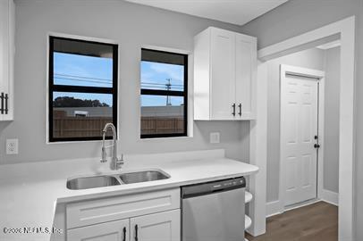 2125 Gilmore Street Jacksonville, FL 32204 - Photo 11 of 18 a kitchen with a sink and cabinets