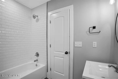 2125 Gilmore Street Jacksonville, FL 32204 - Photo 14 of 18 a bathroom with a bathtub sink and toilet