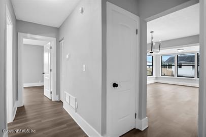 2125 Gilmore Street Jacksonville, FL 32204 - Photo 16 of 18 a view of a hallway with wooden floor and closet