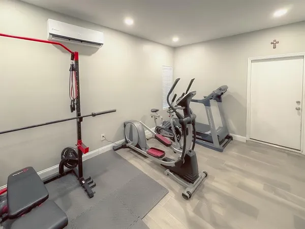 a bedroom with a bed and a cabinets