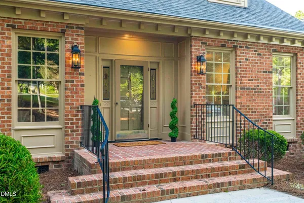 a front view of a house with a porch