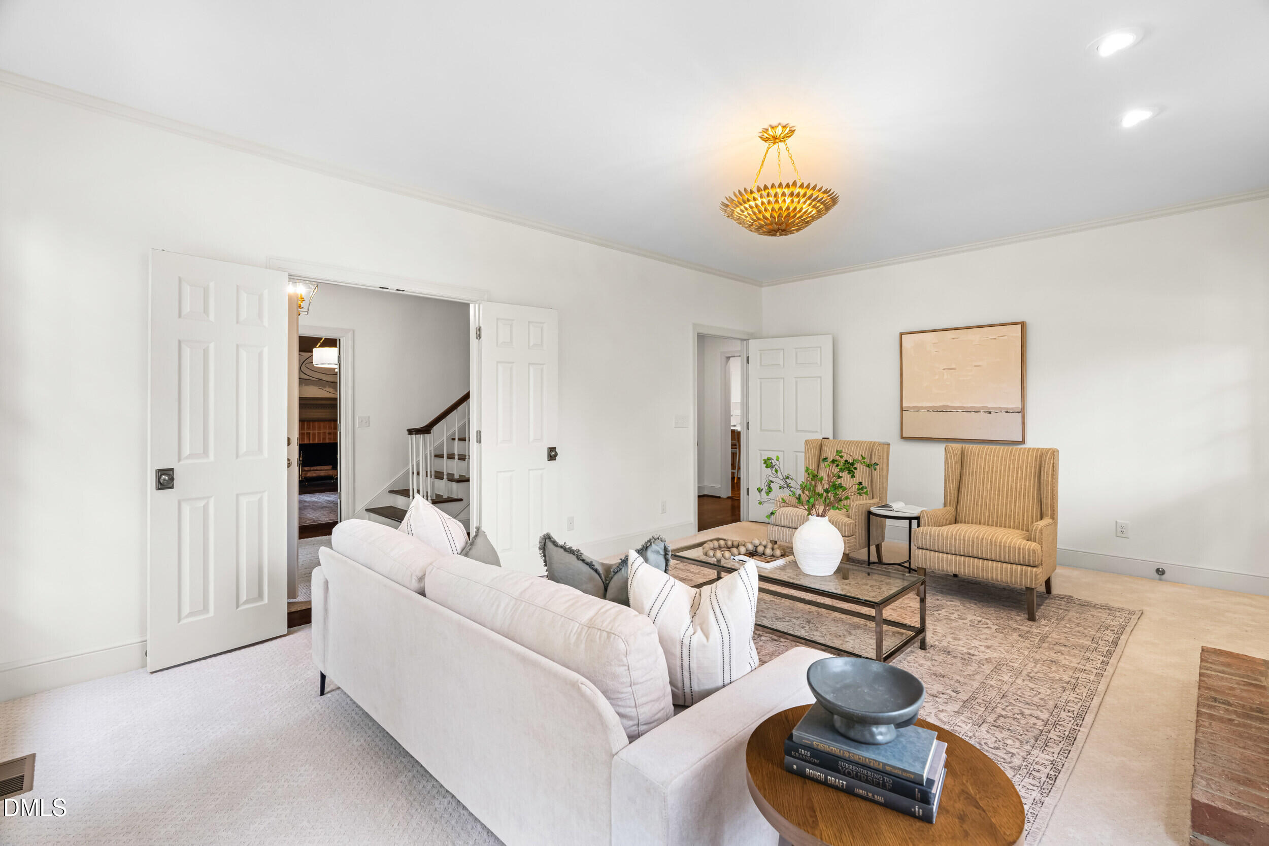 1015 Mulberry Road Clayton, NC 27520 - Photo 14 of 46 a living room with furniture and a rug